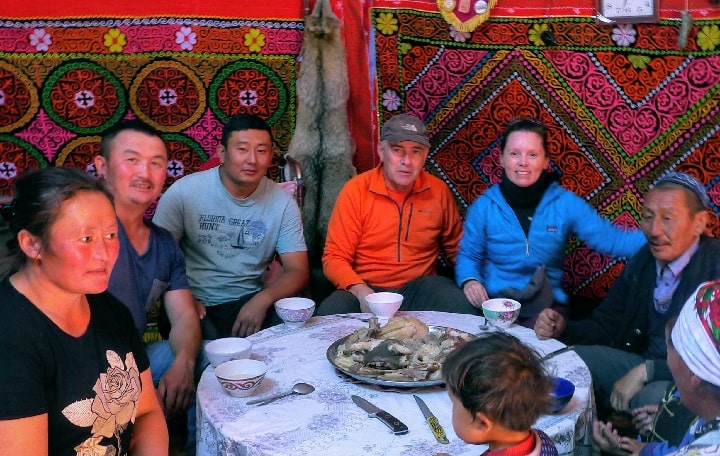 at welcome dinner with herder nomad people in western Mongolia