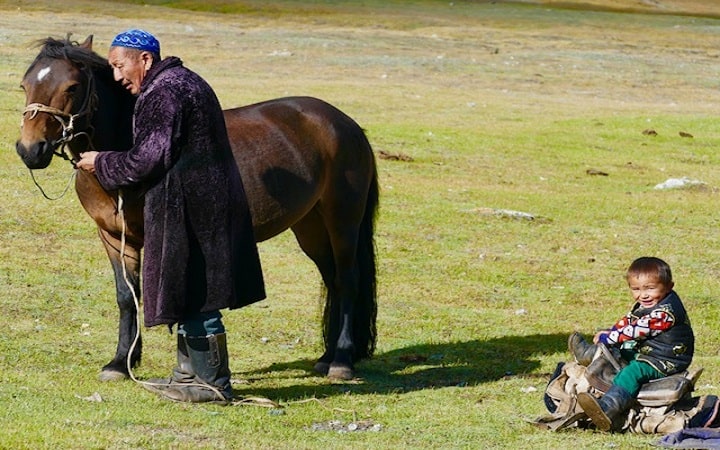 herder man is with his grandson