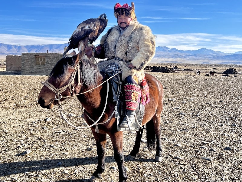 eagle hunter Alpi getting ready for the hunt