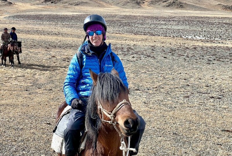 A client returning from eagle hunting - Eagle Hunters Mongolia