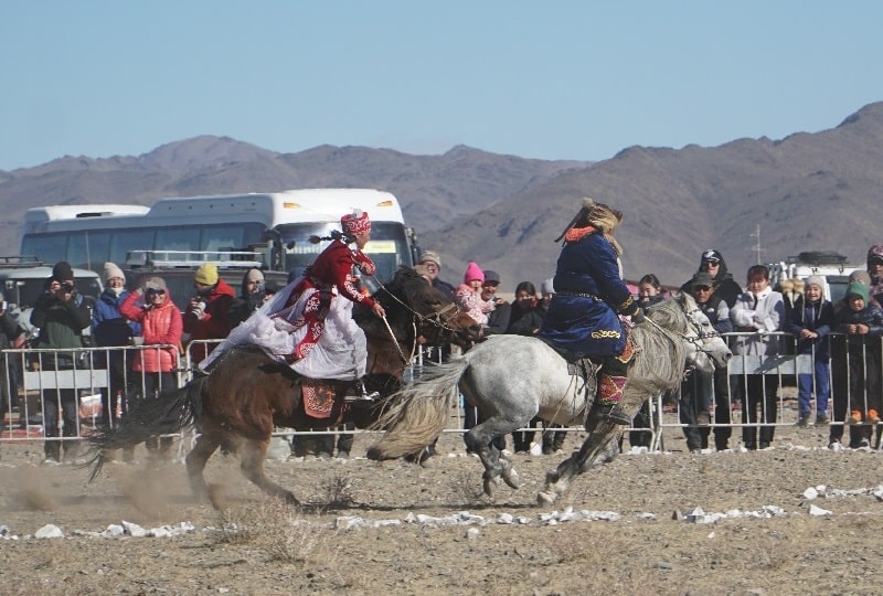 A Kazakh traditional game during the Altai eagle festival, Mongolia - Eagle Hunters Mongolia