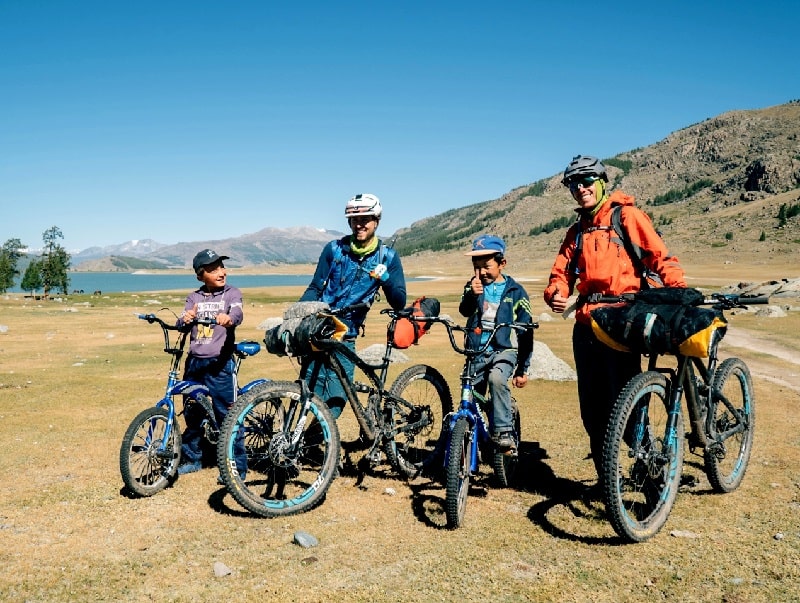 Cyclers with local kids