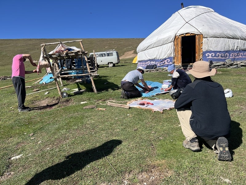 traveler observing nomadic way of life